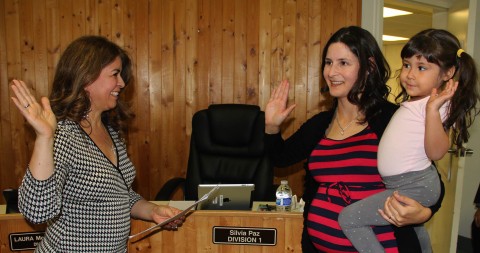 Silvia Paz, holding her daughter, was sworn in to the Desert Recreation District Board of Directors on December 18. Photo: AURORA SALDIVAR/Coachella Uninc