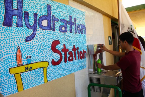 A student gets a refill at Coachella Valley High School's new water bottle station. Photo: COACHELLA UNINC